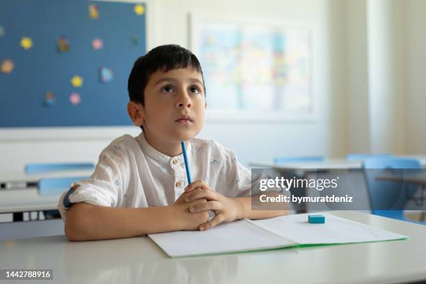 schoolboy seriosly looking - adhs stock pictures, royalty-free photos & images