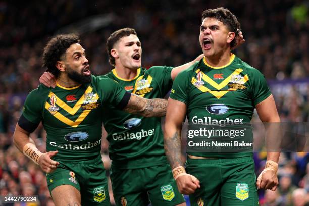 Latrell Mitchell of Australia celebrates their sides first try with teammates during the Rugby League World Cup Final match between Australia and...