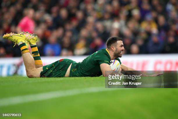 James Tedesco of Australia touches down for their team's second try during the Rugby League World Cup Final match between Australia and Samoa at Old...