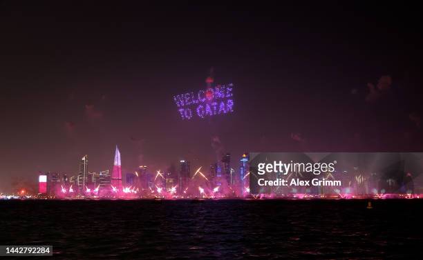 Welcome to Qatar' message is displayed by lightshow over the Doha skyline during the Fan Festival Official Opening ahead of the FIFA World Cup 2022...