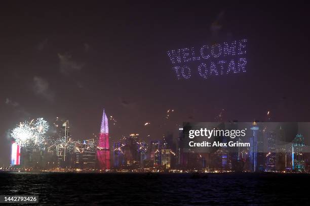 Welcome to Qatar' message is displayed by lightshow over the Doha skyline during the Fan Festival Official Opening ahead of the FIFA World Cup 2022...