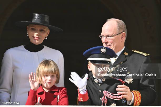 Princess Charlene of Monaco, Prince Albert II of Monaco with Princess Gabriella of Monaco and Prince Jacques of Monaco appear at the Palace balcony...