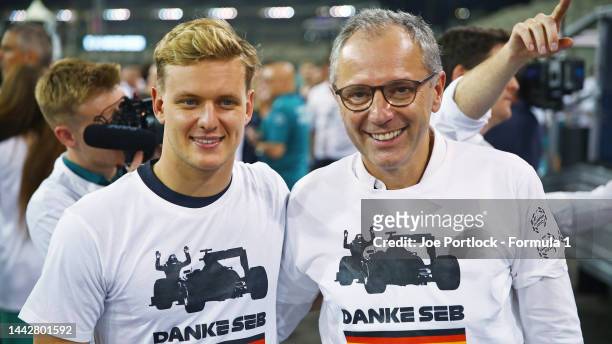 Stefano Domenicali, CEO of the Formula One Group, and Mick Schumacher of Germany and Haas F1 pose for a photo as the F1 community prepare to take...