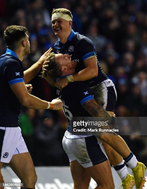 Darcy Graham of Scotland is congratulated by Stuart Hogg of Scotland as he scores his second try of the game during the Autumn International match...