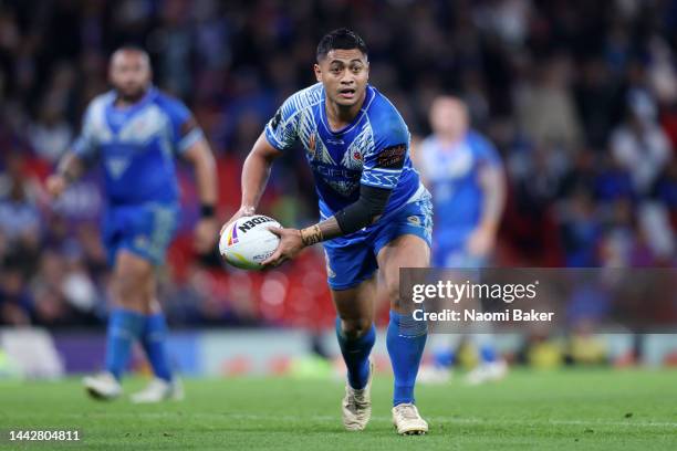 Anthony Milford of Samoa runs with the ball during the Rugby League World Cup Final match between Australia and Samoa at Old Trafford on November 19,...