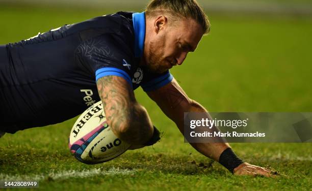 Stuart Hogg of Scotland scores a try during the Autumn International match between Scotland and Argentina at Murrayfield Stadium on November 19, 2022...