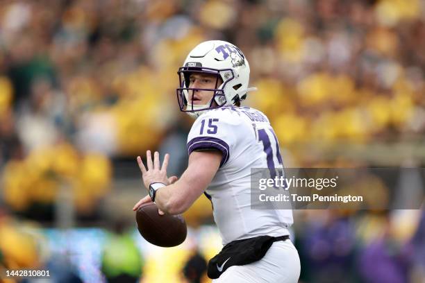 Quarterback Max Duggan of the TCU Horned Frogs looks for an open receiver against the Baylor Bears in the first quarter at McLane Stadium on November...