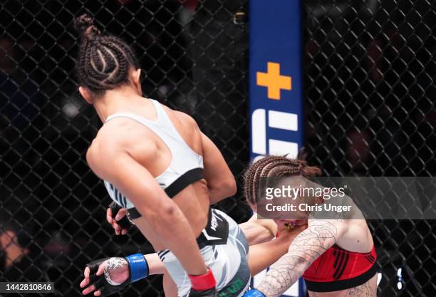 Natalia Silva of Brazil knocks out Tereza Bleda of the Czech Republic in a flyweight fight during the UFC Fight Night event at UFC APEX on November...