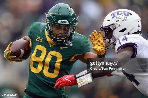 Wide receiver Monaray Baldwin of the Baylor Bears carries the ball against safety Abraham Camara of the TCU Horned Frogs in the first quarter at...