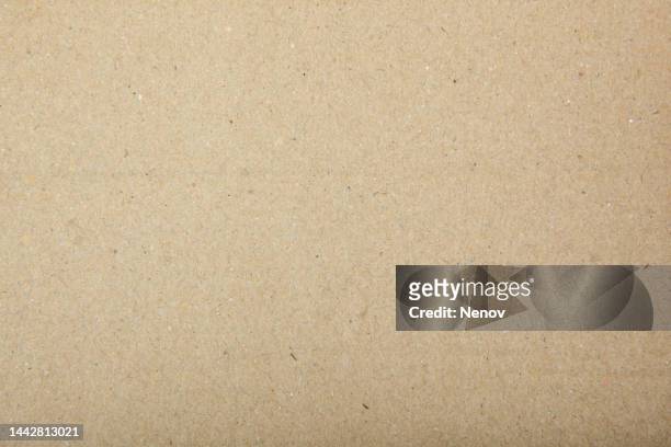 close-up of old brown paper texture background - materiale riciclato foto e immagini stock