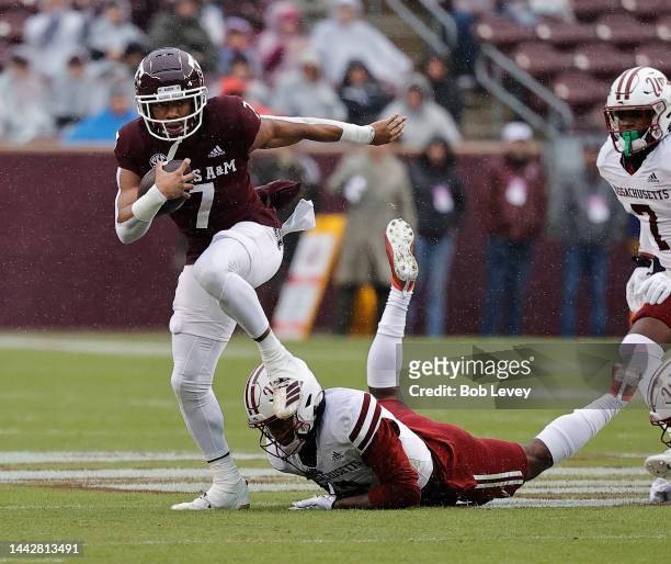 Moose Muhammad III of the Texas A&M Aggies runs with the ball after a catch against the Massachusetts Minutemen during the first quarter at Kyle...