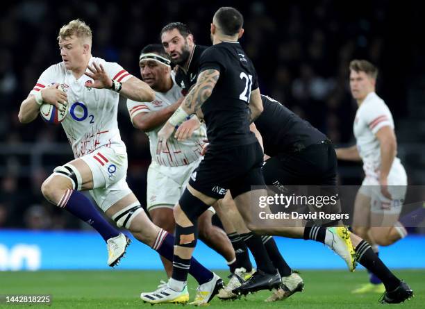 David Ribbans of England runs with the ball during the Autumn International match between England and New Zealand at Twickenham Stadium on November...