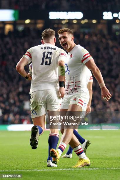 Freddie Steward of England celebrates their sides second try with teammate Henry Slade during the Autumn International match between England and New...