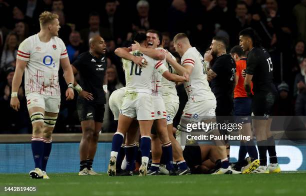 Marcus Smith and Owen Farrell of England celebrate their third try during the Autumn International match between England and New Zealand at...