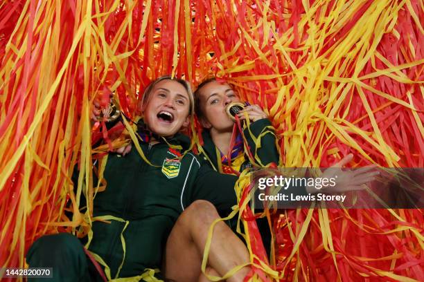 Julia Robinson and Lauren Brown of Australia celebrate with their medals following their side's victory in the Women's Rugby League World Cup Final...