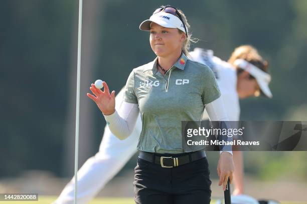 Brooke Henderson of Canada reacts to her putt on the 17th green during the third round of the CME Group Tour Championship at Tiburon Golf Club on...