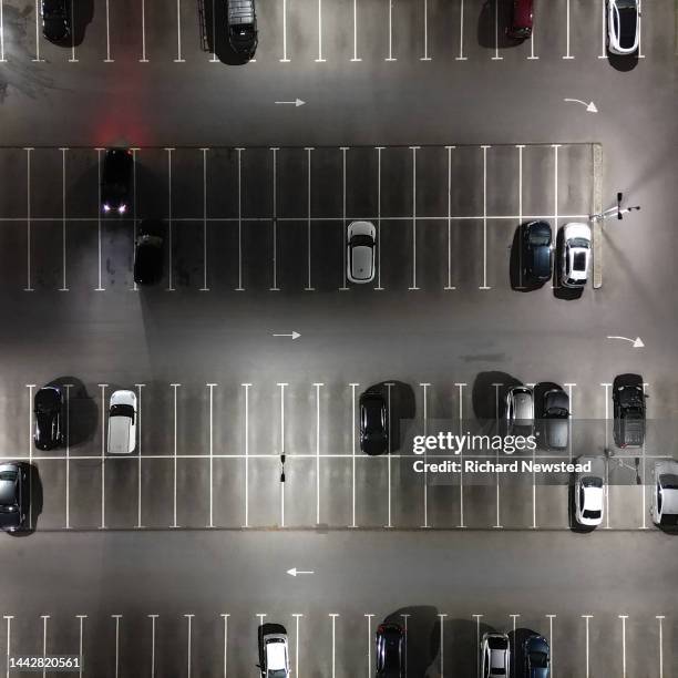 car park at night - aerial park stock pictures, royalty-free photos & images