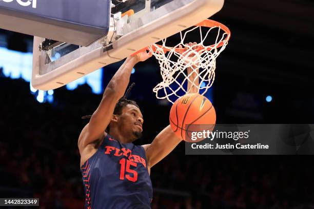 DaRon Holmes II of the Dayton Flyers dunks the ball during the first half in the game against the Robert Morris Colonials at UD Arena on November 19,...