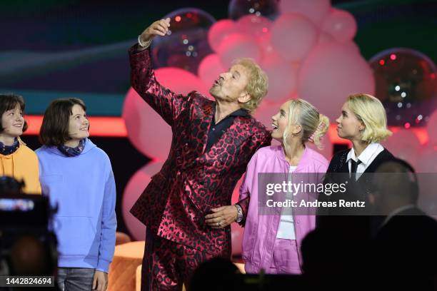 Luise Pfiefer, Mira Pfeiffer, Lisa Mantler, Lena Mantler and Thomas Gottschalk speak seen on stage during the "Wetten, dass...?" Live Show on...