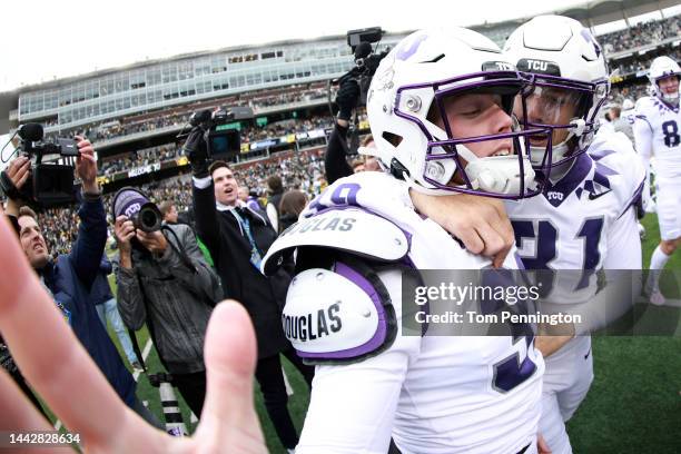 Place kicker Griffin Kell of the TCU Horned Frogs celebrates with punter Jordy Sandy of the TCU Horned Frogs after kicking the game-winning field...