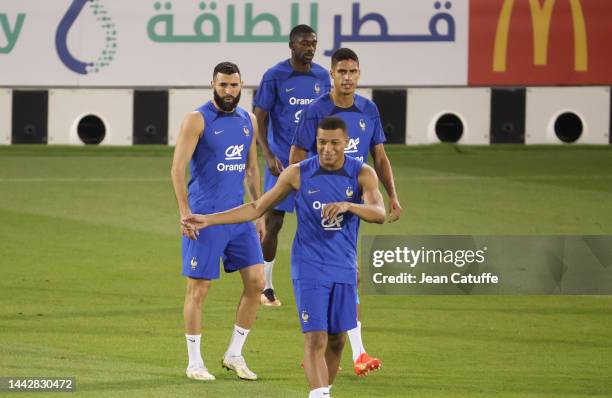 Karim Benzema, Raphael Varane, Kylian Mbappe of France during Team France practice ahead of the FIFA World Cup Qatar 2022 at Al Sadd SC Stadium on...