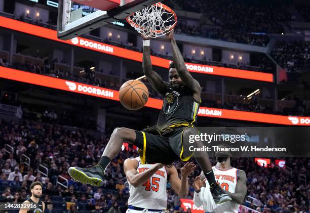 JaMychal Green of the Golden State Warriors slam dunks against the New York Knicks during the fourth quarter of an NBA basketball game at Chase...