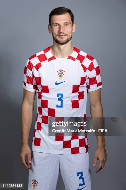 Borna Barisic of Croatia poses during the official FIFA World Cup Qatar 2022 portrait session on November 19, 2022 in Doha, Qatar.