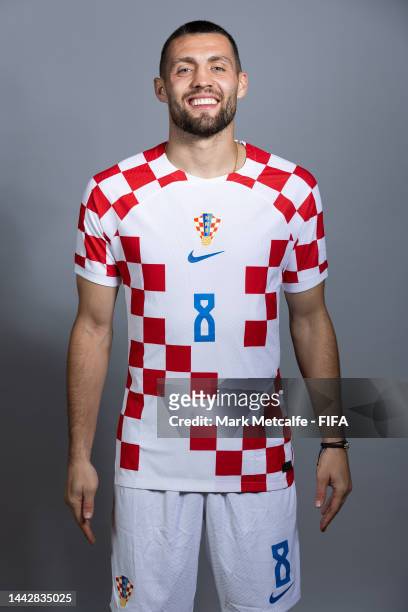 Mateo Kovacic of Croatia poses during the official FIFA World Cup Qatar 2022 portrait session on November 19, 2022 in Doha, Qatar.