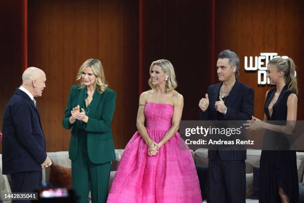 John Malkovich, Veronica Ferres, Michelle Hunziker, Robbie Williams and Lilly Krug speak on stage during the "Wetten, dass...?" Live Show on November...