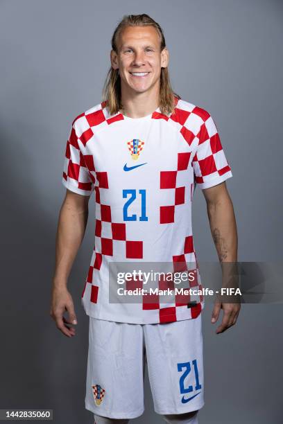 Domagoj Vida of Croatia poses during the official FIFA World Cup Qatar 2022 portrait session on November 19, 2022 in Doha, Qatar.