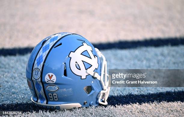 Detailed view of a University of Virginia helmet sticker, in honor of the three Virginia football players who were killed in a shooting, is seen on...