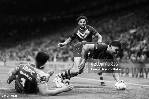 Latrell Mitchell of Australia scores his sides first try during the Rugby League World Cup Final match between Australia and Samoa at Old Trafford on...