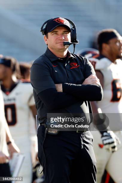 Head coach Jonathan Smith of the Oregon State Beavers watches a replay during the second half against the Arizona State Sun Devils at Sun Devil...