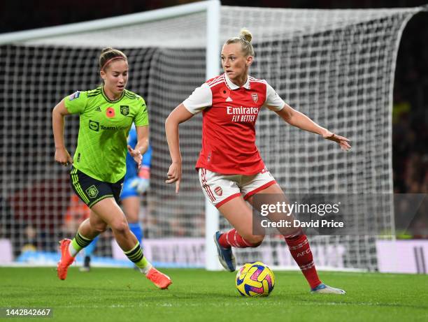 Stina Blackstenius of Arsenal is challenged by Maya Le Tissier of Man Utd during the WSL match between Arsenal Women and Manchester United Women...