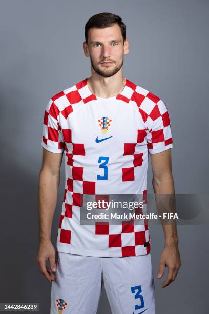 Borna Barisic of Croatia poses during the official FIFA World Cup Qatar 2022 portrait session on November 19, 2022 in Doha, Qatar.