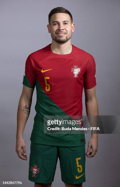 Raphael Guerreiro of Portugal poses during the official FIFA World Cup Qatar 2022 portrait session on November 19, 2022 in Doha, Qatar.
