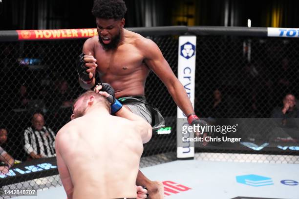 Kennedy Nzechukwu of Nigeria drops Ion Cutelaba of Moldova with a flying knee in a light heavyweight fight during the UFC Fight Night event at UFC...