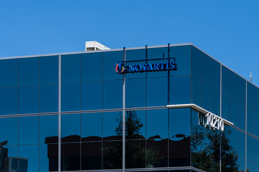 Novartis logo on the office building in San Diego, CA, USA.