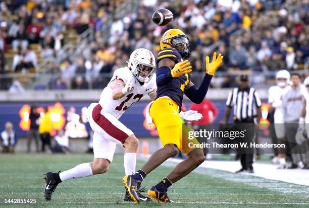 Michael Sturdivant of the California Golden Bears can't hold on to the pass while getting hit by Ethan Bonner of the Stanford Cardinal during the...