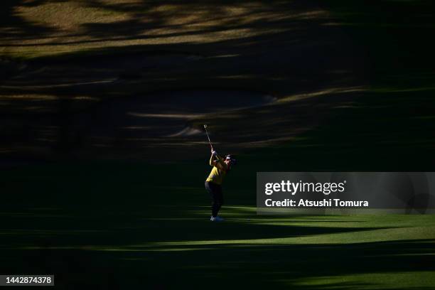 Kana Nagai of Japan hits her second shot on the 4th hole during the final round of Daio Paper Elleair Ladies at Elleair Golf Club Matsuyama on...
