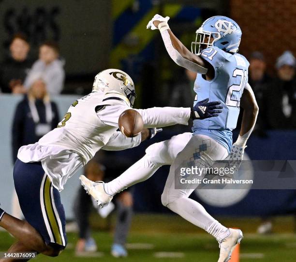 Dylan McDuffie of the Georgia Tech Yellow Jackets breaks up a pass intended for Elijah Green of the North Carolina Tar Heels during the second half...