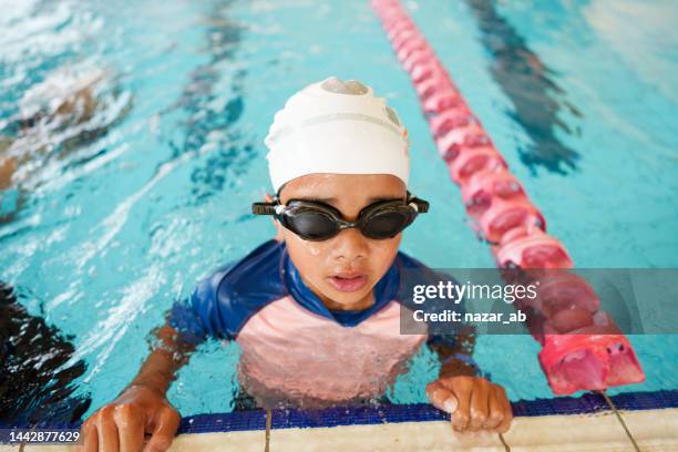 taking a break. - swimming cap stock pictures, royalty-free photos & images