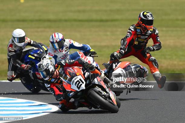 Wayne Maxwell of Australia crashes his The Construction Team Ducati in Race 2 of the Australian Superbikes during the 2022 MOTUL FIM Superbike World...