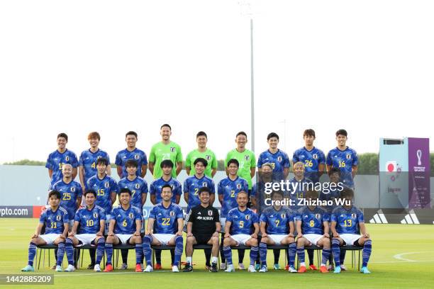 Players and coach of Japan attend the team group photo call during Japan Training and Press Conference at Al Sadd SC New Training Facilities 1 on...