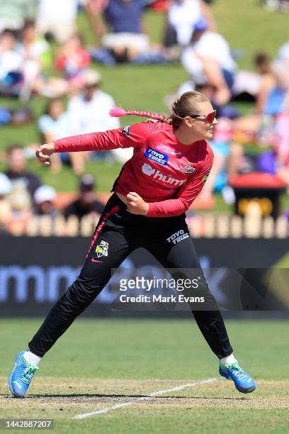 Sophie Ecclestone of the sixers bowls during the Women's Big Bash League match between the Sydney Sixers and the Hobart Hurricanes at North Sydney...