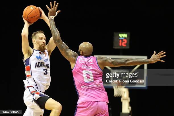 Anthony Drmic of the Adelaide 36ers looks to pass with Derek Pardon of the New Zealand Breakers defending during the round seven NBL match between...
