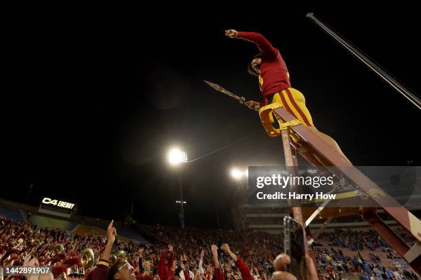 Caleb Williams of the USC Trojans celebrates after defeating the UCLA Bruins in the game at Rose Bowl on November 19, 2022 in Pasadena, California....