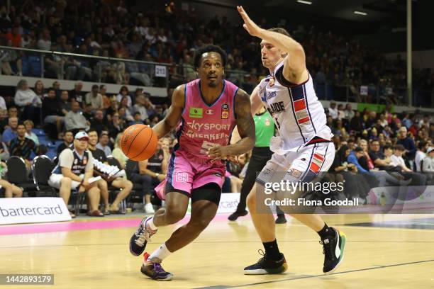 Barry Brown Jr of the New Zealand Breakers with Mitch McCarron of the Adelaide 36ers during the round seven NBL match between New Zealand Breakers...