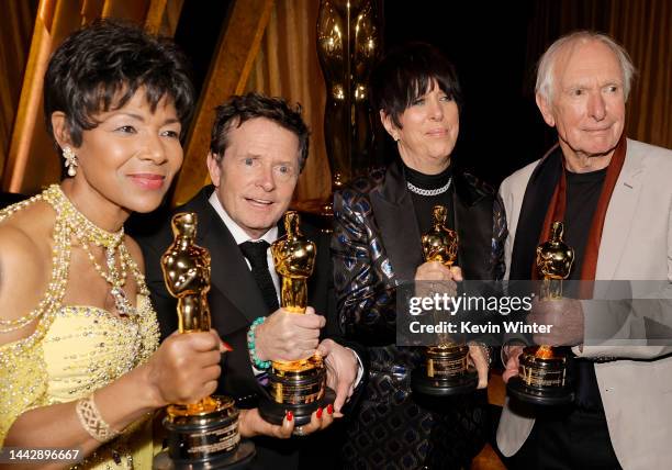 Euzhan Palcy, Michael J. Fox, Diane Warren, and Peter Weir pose with their awards during the Academy of Motion Picture Arts and Sciences 13th...