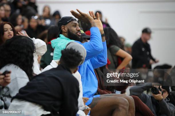 LeBron James of the Los Angeles Lakers motions to players during the game between the Cleveland Cavaliers and the Sierra Canyon Trailblazers at...